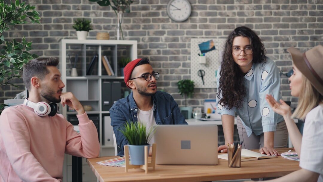 group of millennials discussing finances