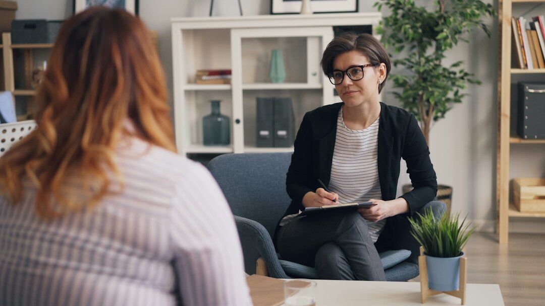 person in therapy session